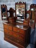 Dressing chest with triple mirror